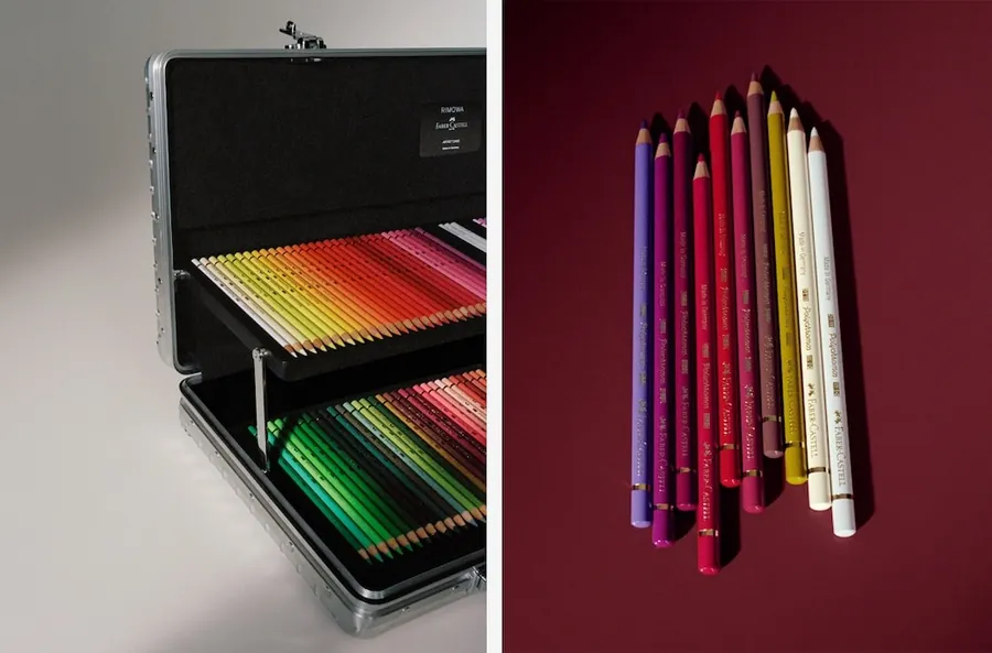 El Artist Case de RIMOWA × Faber-Castell abierto con su bandeja de lápices de colores, junto a un manojo de lápices Faber-Castell